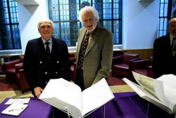 Drs. Hast and Garrison with the two volumes of the new Fabrica